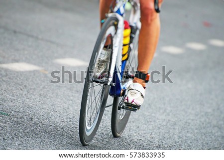 Unrecognizable professional cyclist during the bicycle competition.