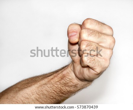 Male fist Royalty-Free Stock Photo #573870439