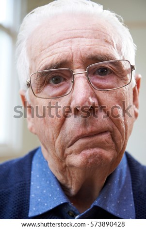 Portrait Of Senior Man Suffering From Stroke Royalty-Free Stock Photo #573890428