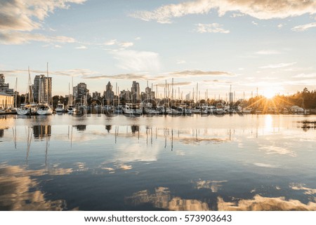 Marina and city skyline at dusk, Vancouver, Canada