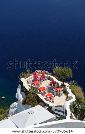 Luxury outdoor sea view cafe of Oia, Santorini, Greece. Lot of copyspace.
