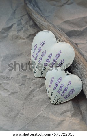 two decorative hearts with lavender picture on old paper background. Valentine's day, 14 february holiday concept. symbol of love, romance. rustic provence style. 