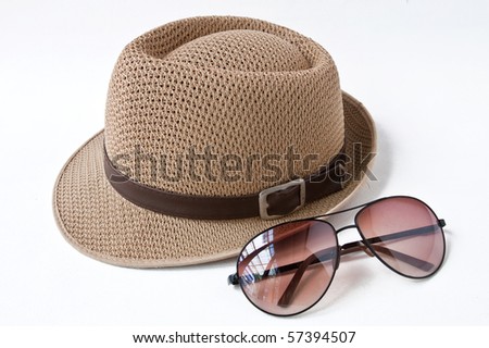Woven hat with sunglasses Royalty-Free Stock Photo #57394507
