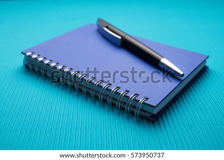 Pen with notebook