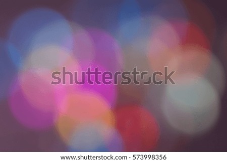 festive background of twinkling red, blue, pink, yellow, white lights