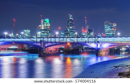 Blackfriars bridge in central London against the backdrop of the City of London financial district