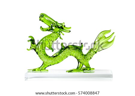 Glass green traditional chinese dragon isolated on white background. Feng Shui statuette.