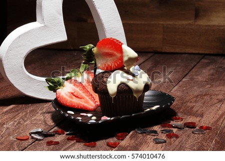 cake for Valentine day with chocolate, white chocolate and strawberries