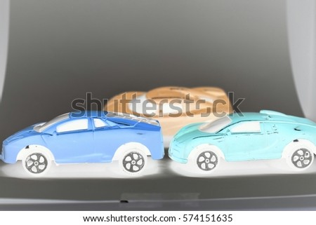 Toy Cars isolated on black background with photo negative effect. 3d illustration