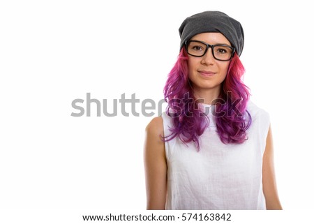 Studio shot of young beautiful woman wearing eyeglasses