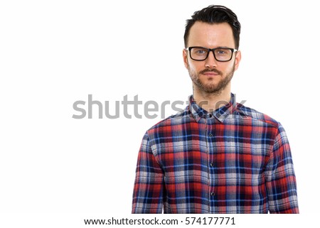 Studio shot of young man wearing eyeglasses