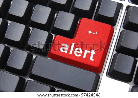 alert button on a black computer keyboard Royalty-Free Stock Photo #57424546