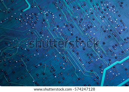 Printed green computer circuit board with many electrical components