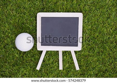 Golf ball and blackboard