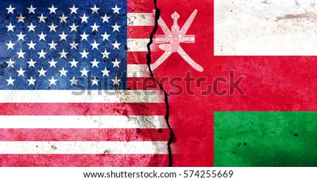 A large crack in the wall. USA flag. Flag of Oman