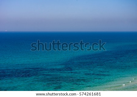 The sea to the horizon. Royalty-Free Stock Photo #574261681