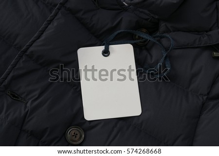 Tag on a Dark Jacket