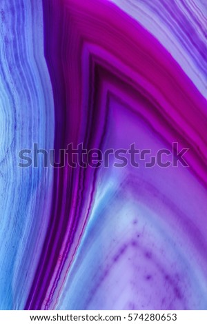 Photo of a pink, purple and blue Geode slice Royalty-Free Stock Photo #574280653