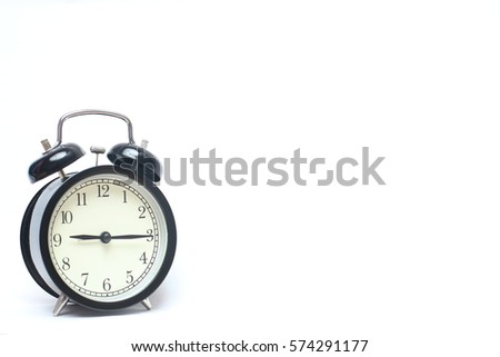 Retro alarm clock isolated on white background.