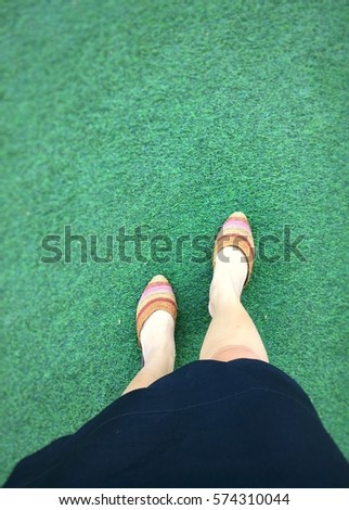 women ware shoes sisal plant on green floor.
natural product of thailand