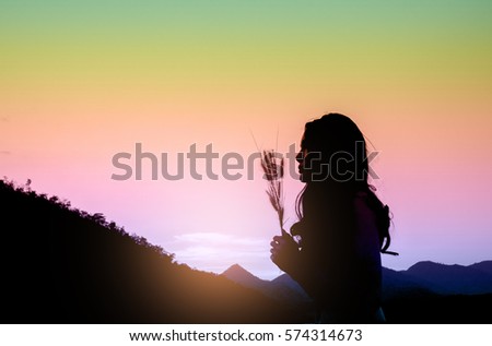silhouette of young women in sunset,colorful tone