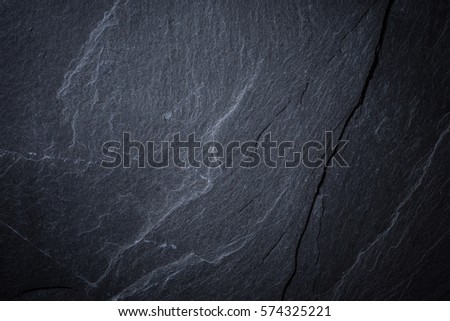 Dark gray slate texture, abstract background Royalty-Free Stock Photo #574325221