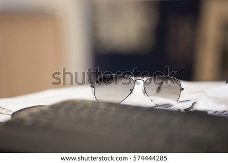 EYE GLASS - eye glass put on the white table