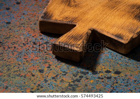 Vintage brown wooden board on and dark blue background, horizontal