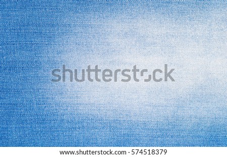 Natural blue jeans texture background.