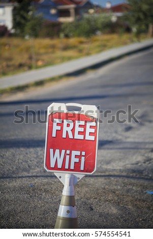 old wi-fi sign on the road in the summer.