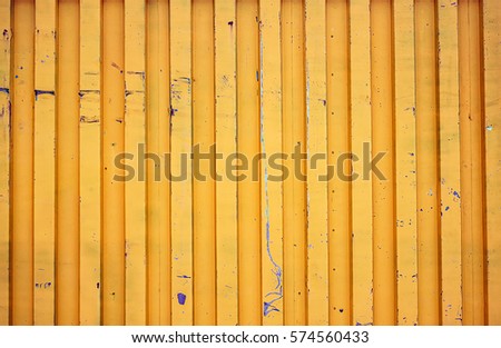 Yellow shipping container background texture Royalty-Free Stock Photo #574560433