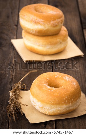 donut sugar caramel on wood