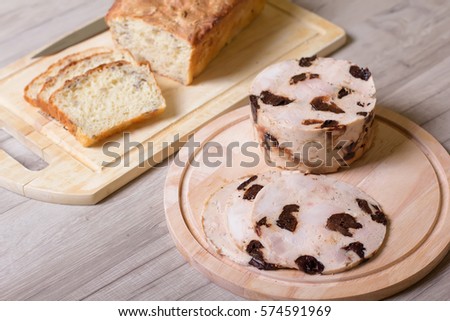 Homemade ham with prunes and homemade wheat bread with seeds
