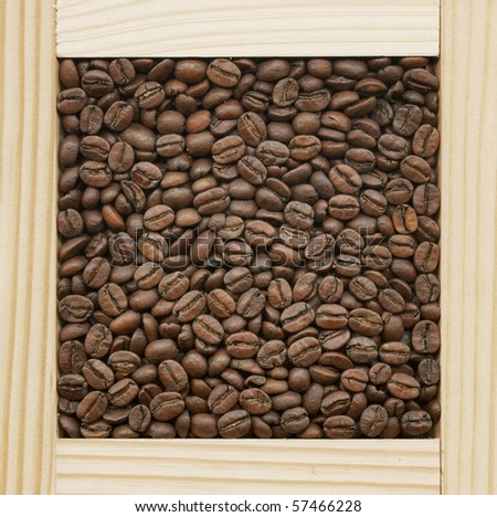 Coffee beans in a wooden frame