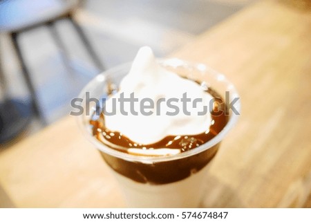 Picture blurred  for background abstract and can be illustration to article of ice-cream on table in cafe
