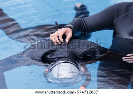 Free diving training on swimming pool Royalty-Free Stock Photo #574712887