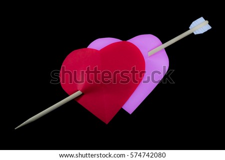 paper heart and wooden arrow