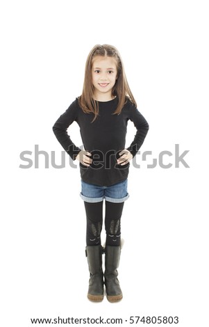Little girl poses for a picture.  Isolated on white background 