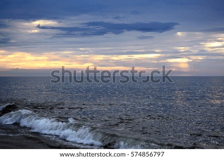 Summertime Seashore Sunrise with Heavenly Skies Above