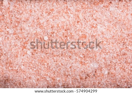 Pink sea salt closeup Royalty-Free Stock Photo #574904299