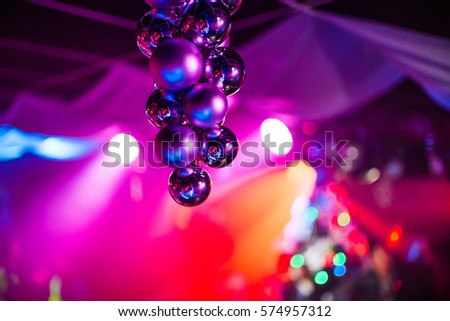 beautiful bright background with multicolored Christmas balls on front background with reflection