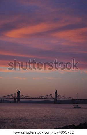 Beautiful Cloud formations over the Tappanzee Bridge and Hudson River in New York at Dusk