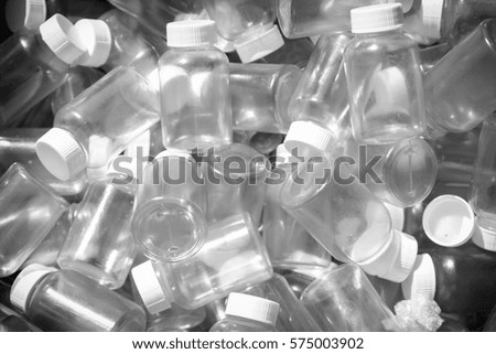Pile of empty plastic bottle for concept background,Black and White