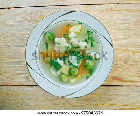 Soup alla Canavese - Italian soup made from white stock, tomato puree, butter, carrot, celery, onion, cauliflower