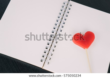 Valentines Red heart on blank notebook diary
