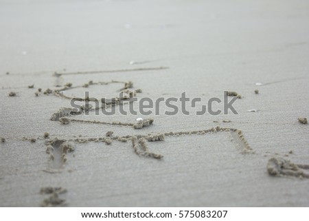 Write love on the sand.