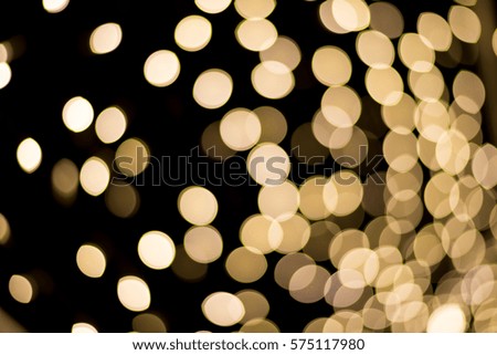 Abstract circles of bright lights in in the dark