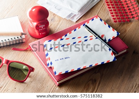 air mail envelope on the wood table