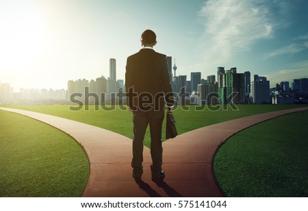 indecisive man and lost chooses the right path Royalty-Free Stock Photo #575141044
