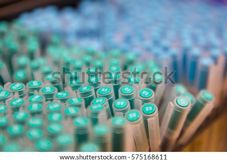 Close up shot of pastel pens, background.